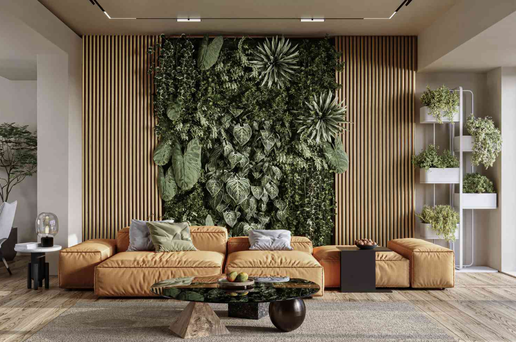 A living wall of layered greenery beside a warm oak slat wall and tan leather sectional.
